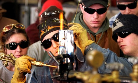 Students crowding a weld