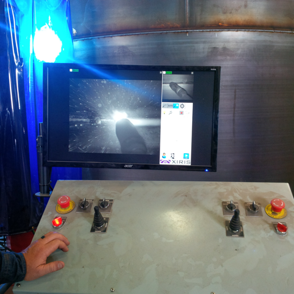 weld process being monitored from a safe environment